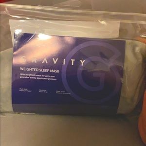 Gravity weighted sleep mask